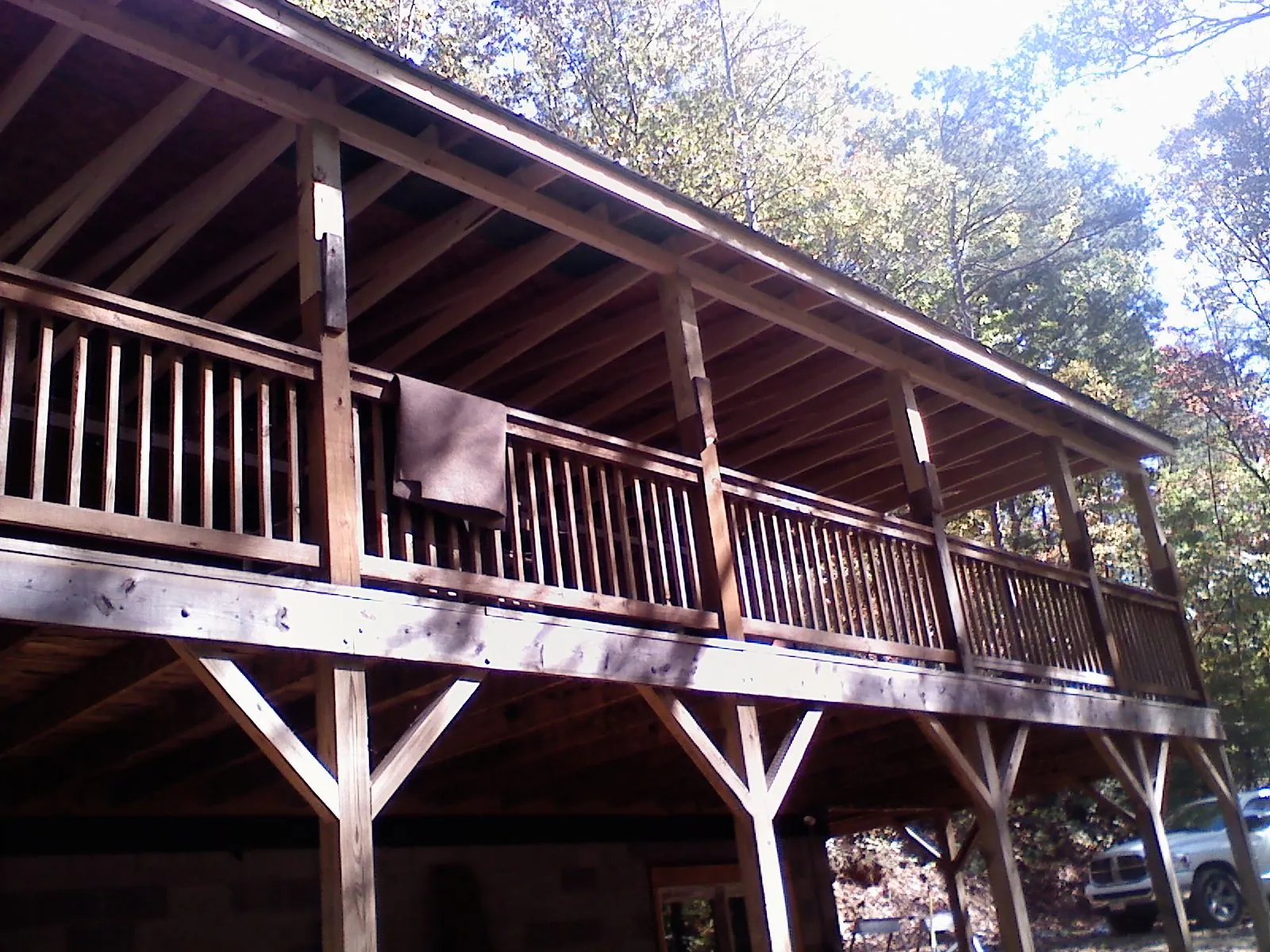 Timber framing under a new elevated porch and deck — Roof Leak Repair in Fargo by Roofing Brothers